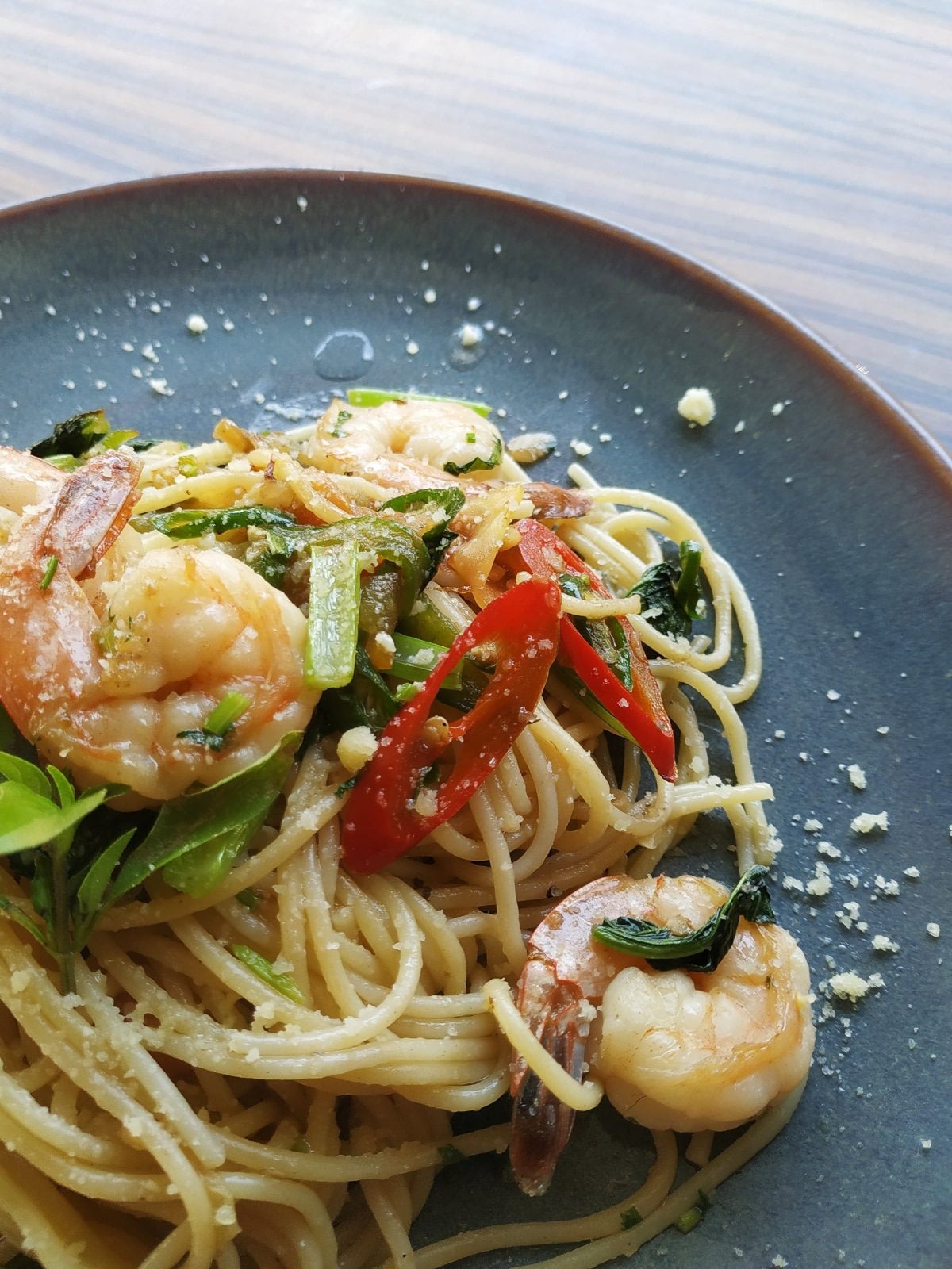 Plate with shrimp pasta and vegetables
