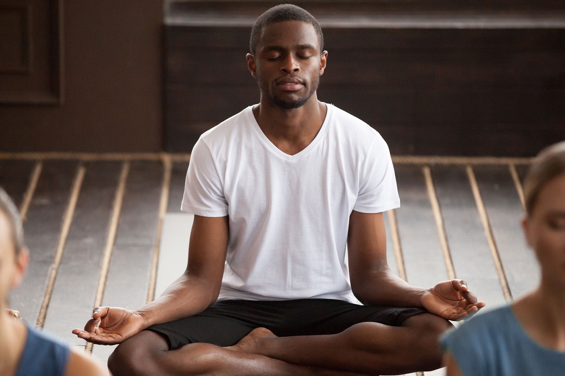 man practicing meditation using a meditation app