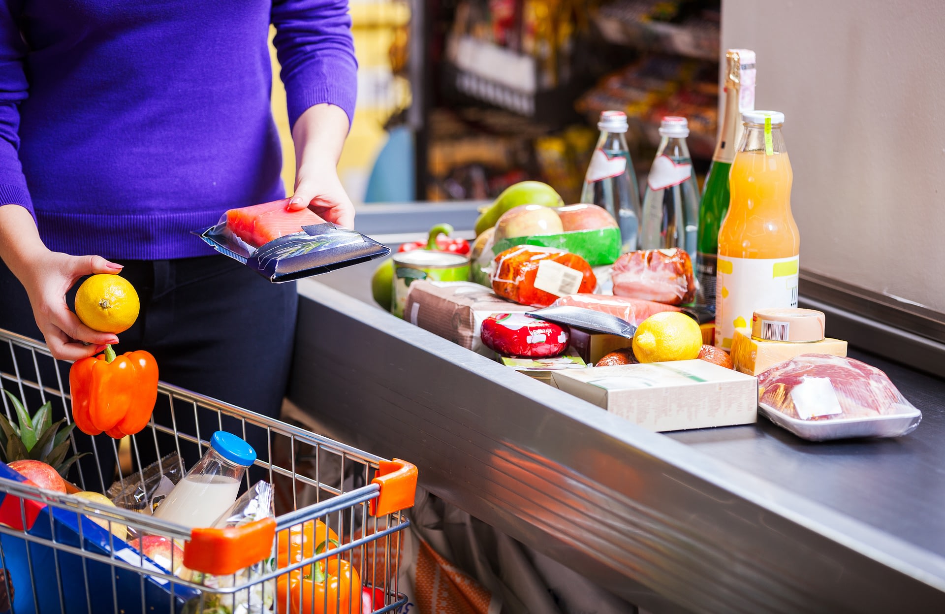 A savvy shopper utilizing grocery list hacks for a balanced diet