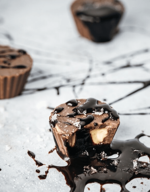 Chocolate cups with filling and dark chocolate drizzle