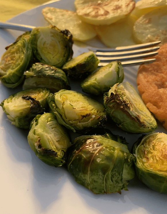 A plate of crispy Brussels Sprouts made in an air fryer