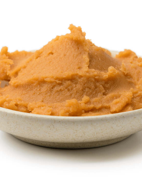 A bowl of miso paste used to boost gut health