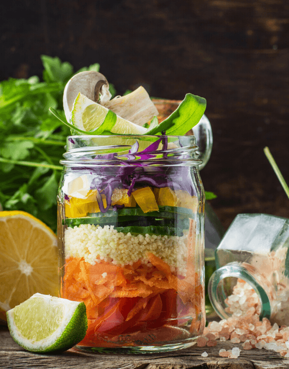 A glass jar of salad for a keto lunch