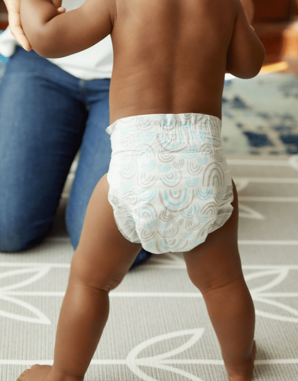 Baby wearing pull-up diapers to hep making traveling easy