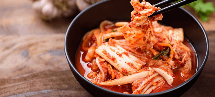 A bowl of fermented kim chi that helps speed up the digestion process