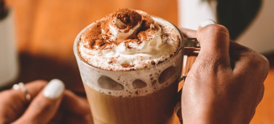 Pumpkin spice latte with whip cream, cinnamon, and CBD