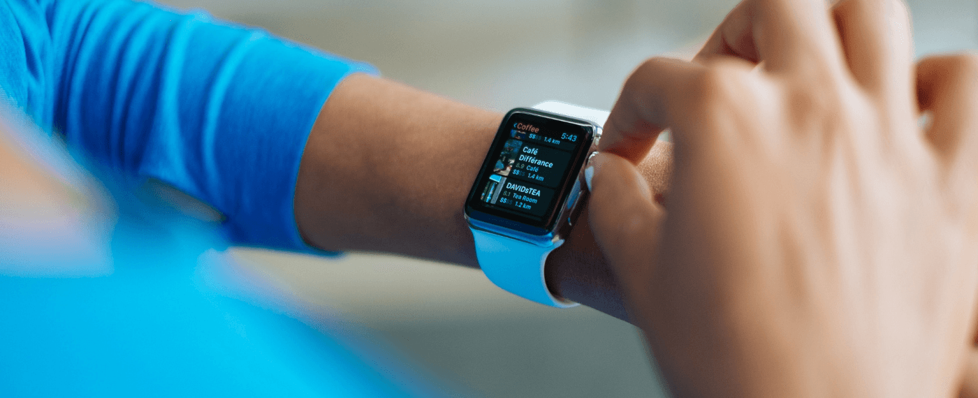 A smart watch displaying a fitness app