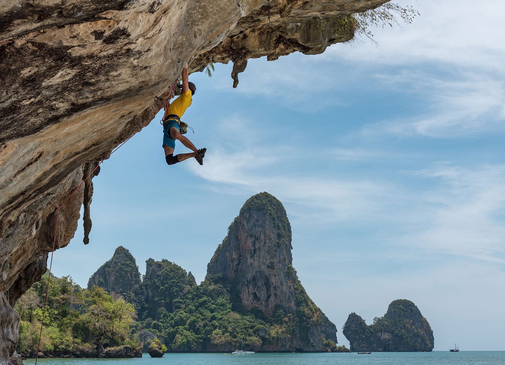 Man using motivation habits to help overcome rock climbing