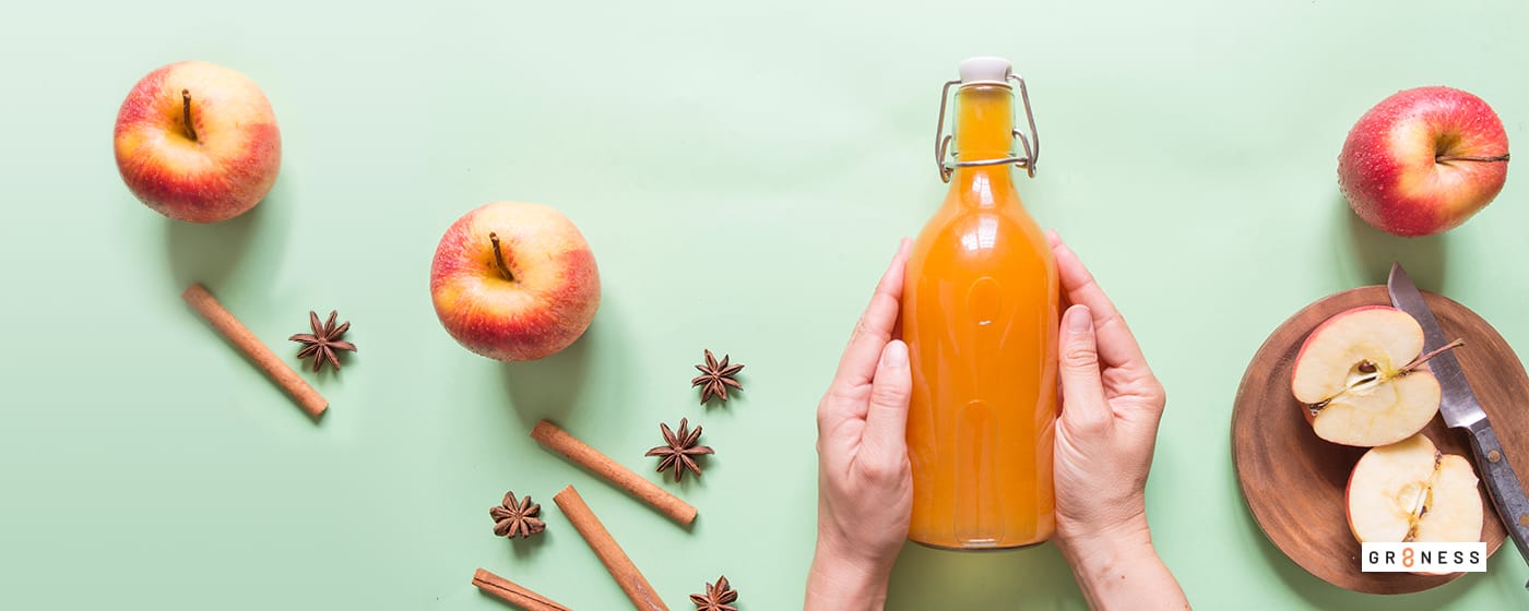 A glass bottle of apple cider vinegar