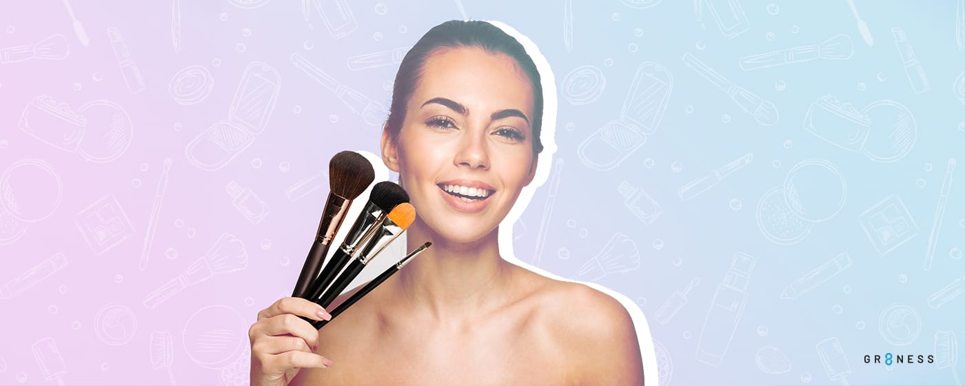GRaphically designed image of woman holding up a variety of makeup brushes to her cheek playfully