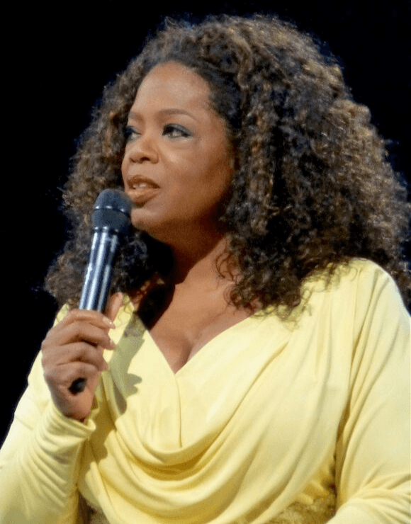 Oprah holding a microphone speaking about social anxiety