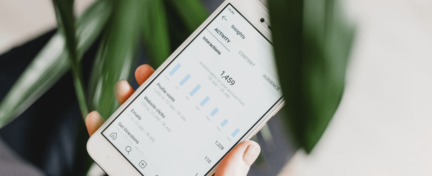 Smartphone displaying social media insights for mental health