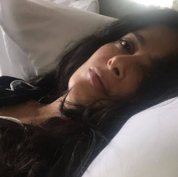 Salma Hayek poses for the camera with a refreshing no makeup look