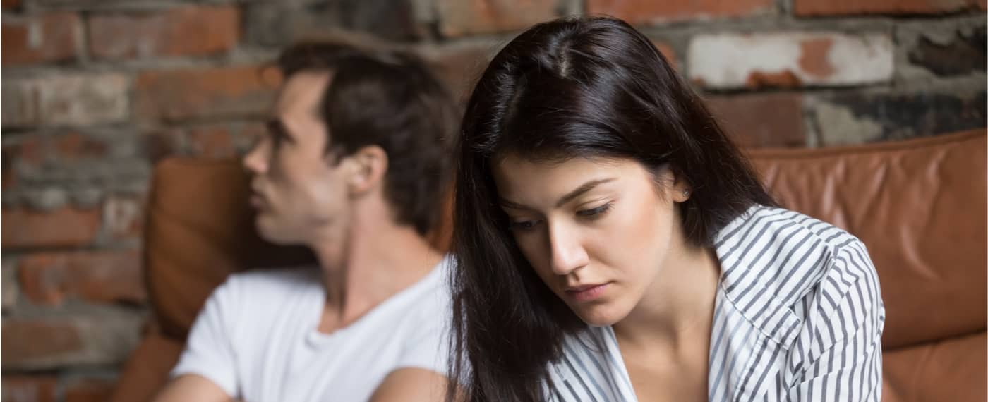 Man and woman in toxic relationship refusing to look at each other