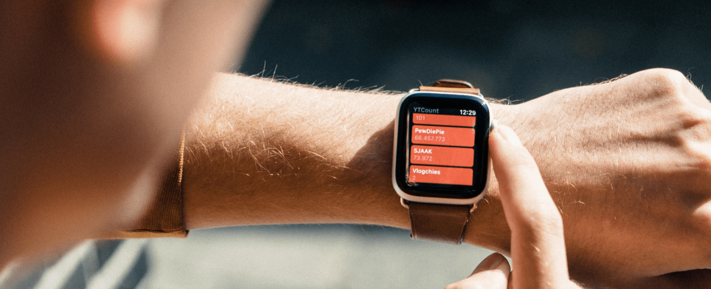 Orange smart watch with fitness tracker screen