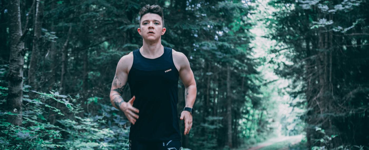 Young man jogging outside