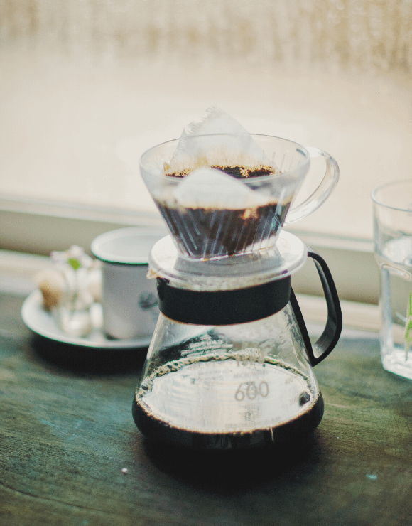 A glass pot of coffee used for hair dye