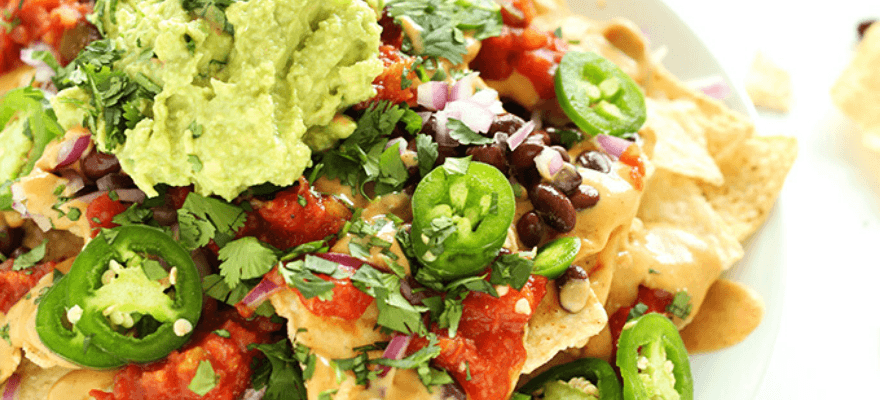 A plate of healthy loaded veggie nachos