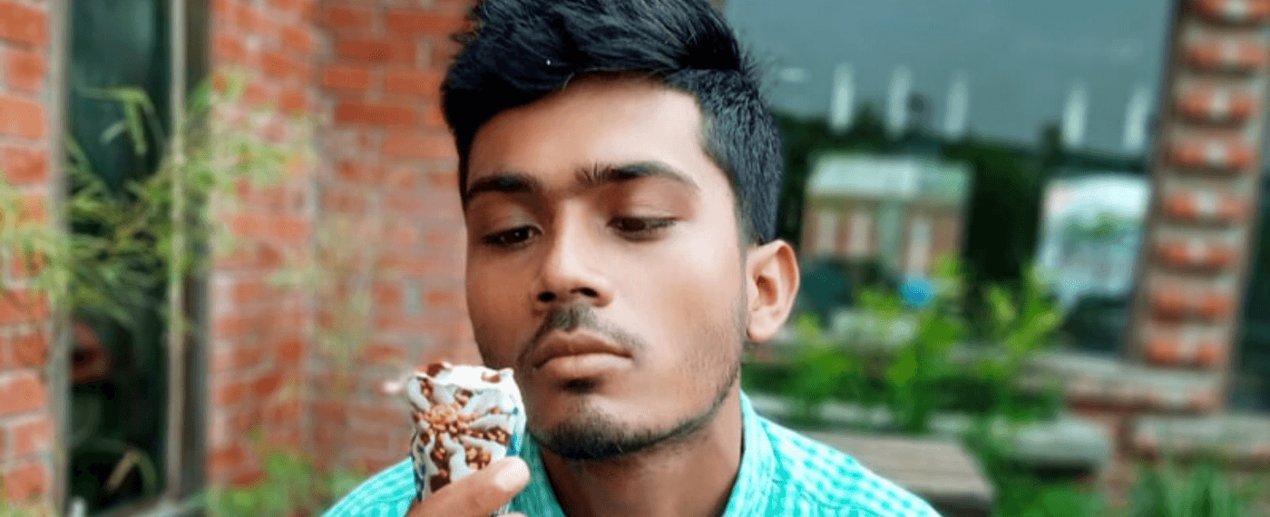 Man looks depressed at ice cream cone
