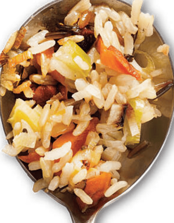 A spoonful of Dried Cherry Wild Rice Stuffing and Toasted Pecans