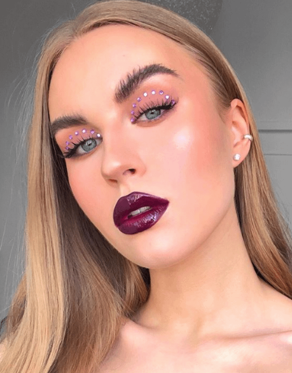 Viral blogger shows off trendy rhinestone eyelid makeup