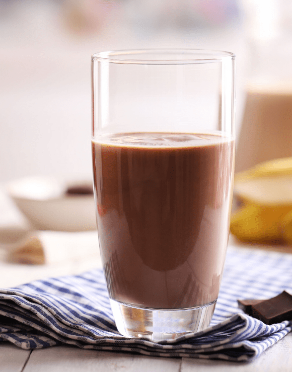 A tall glass of healthy chocolate milk